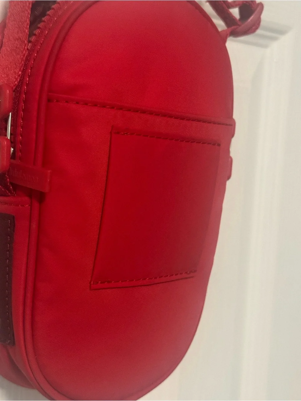 Lululemon Women’s Red Crossbody or belt bag. Zippered, outside phone pocket